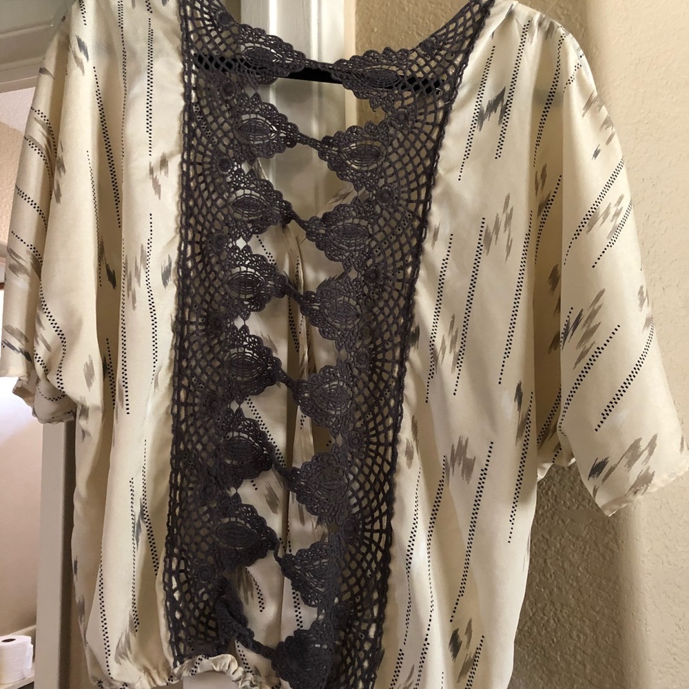 Open back blouse 100% polyester